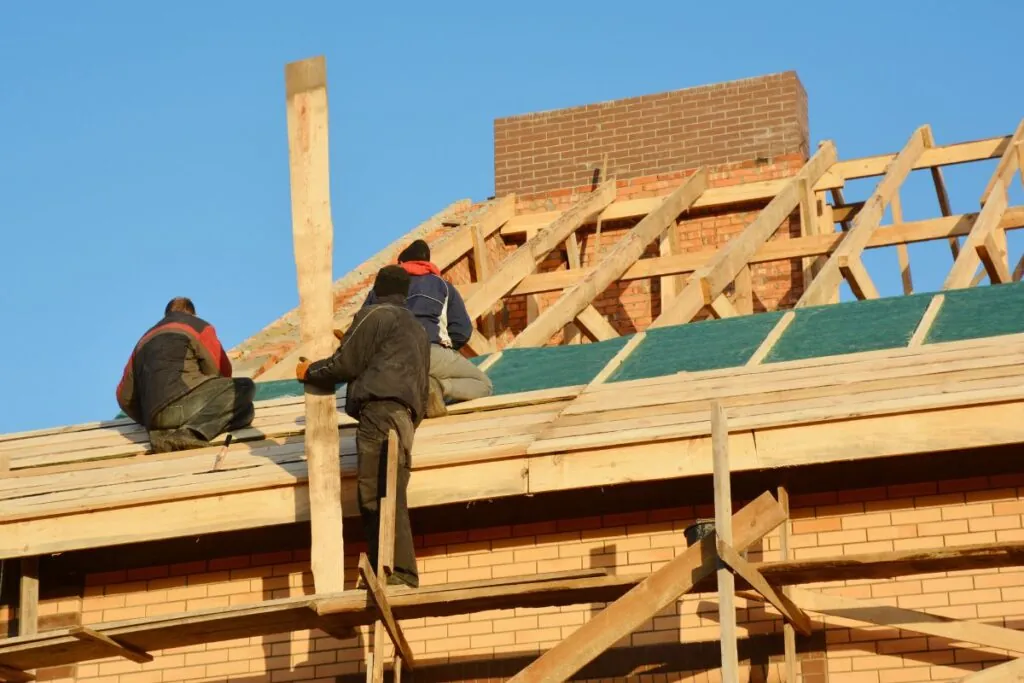 Residential Roofing Contractors installing deck frame for shingle roof installation